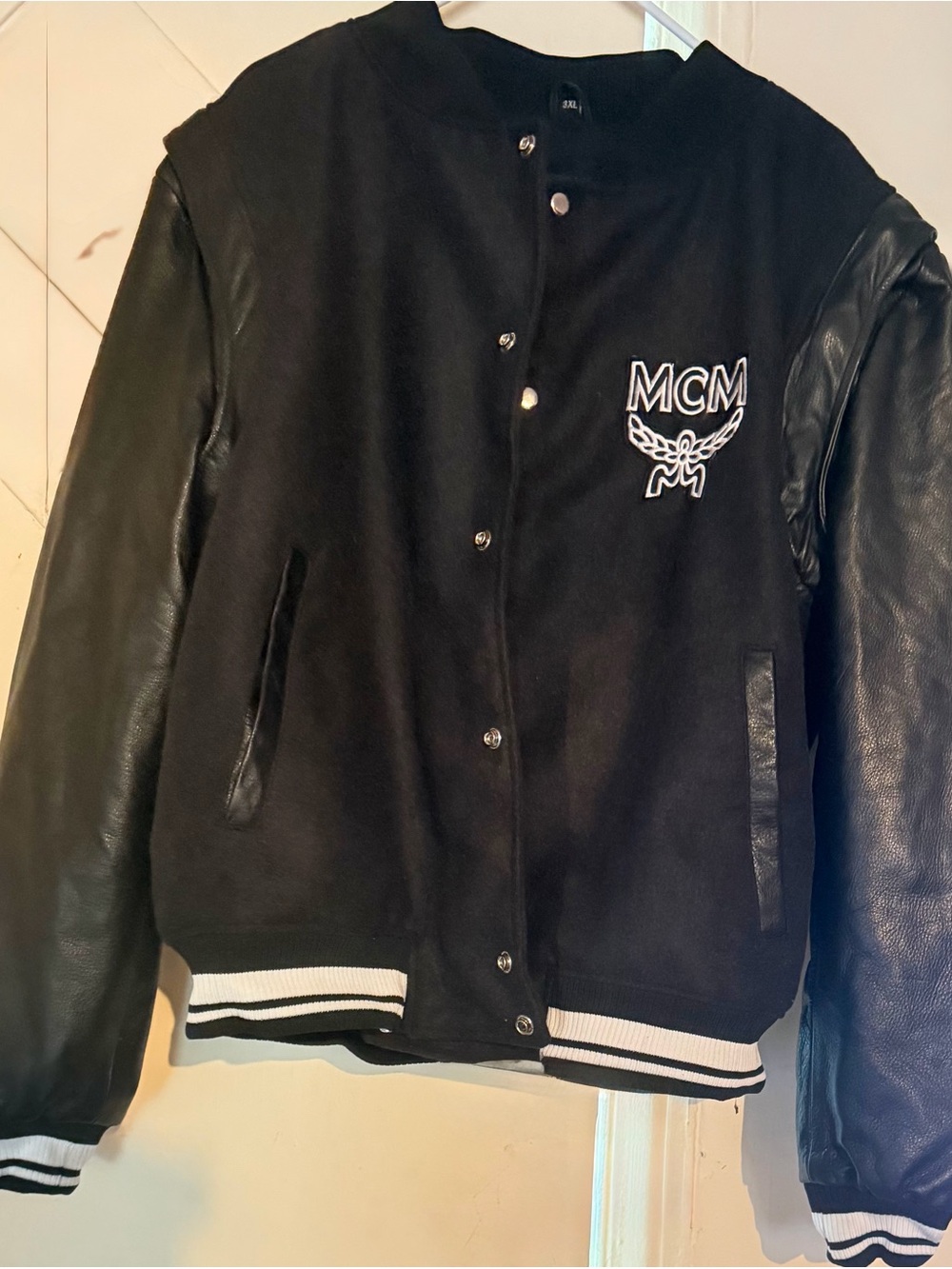 MCM women’s Black Varsity Jacket with Leather Sleeves